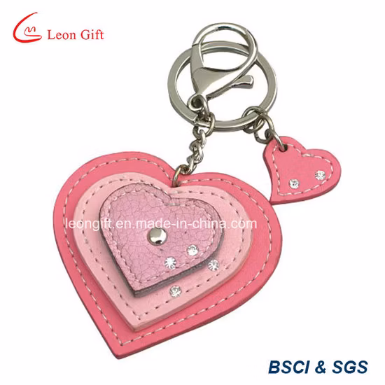 Ciondolo alla moda con logo personalizzato con portachiavi in ​​metallo in pelle a forma di cuore di cristallo